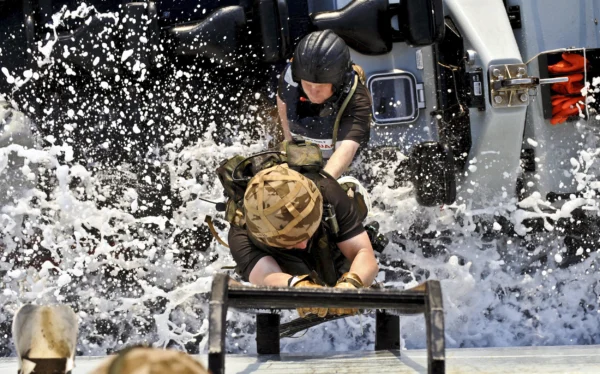 HMS Corwall's Royal Marines Practice Ship Boarding Techniques